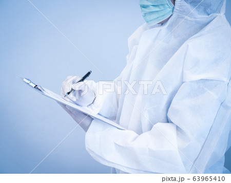Asian doctor in personal protective suit wearing 63965410
