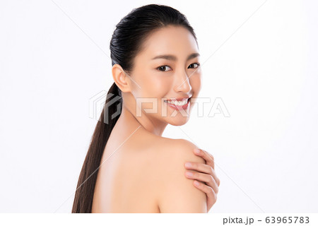 Beautiful Young Asian Woman with Clean Fresh Skin. Face care, Facial treatment, Cosmetology, beauty Beautiful Young Asian Woman with Clean Fresh Skin. Face care, Facial treatment, Cosmetology, beauty 63965783