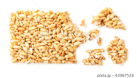 Puffed rice in pieces on a white. Isolated Puffed rice in pieces on a white. Isolated 63967528