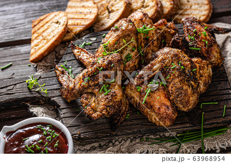 Grilled barbecue chicken wings 63968954