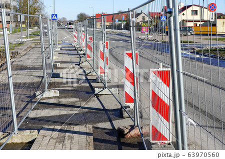 demarcation of the area with metal fencing and demarcation of the area with metal fencing and 63970560