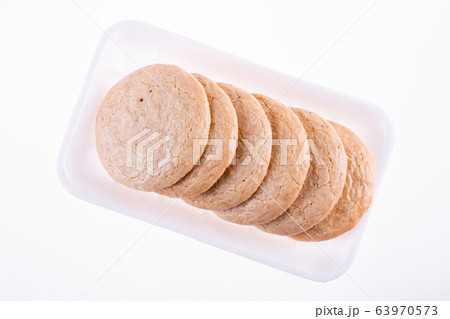Oatmeal biscuits with beze on the substrate 63970573