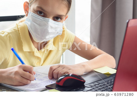 The sick girl in self-isolation mode does her The sick girl in self-isolation mode does her 63971280