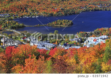 Mont Tremblant village and lake and autumn colors background, Quebec, Canada 63971942