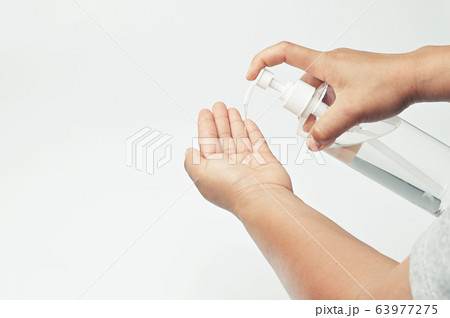 hand pump alcohol gel in bottle for cleaning 63977275