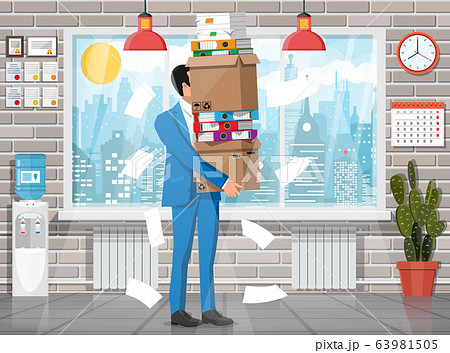 Businessman in pile of office papers Businessman in pile of office papers 63981505