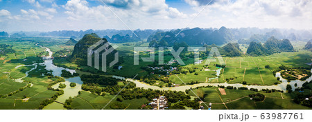 Rural Chinese landscape of limestone rocks and 63987761