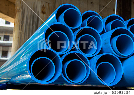 PVC pipes stacked in construction site PVC pipes stacked in construction site 63993284
