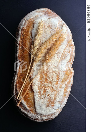 Homemade bread on black board. 63994394