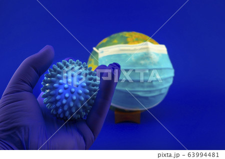 Pandemic concept with virus molecule and globe 63994481