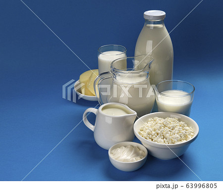 Dairy products on blue wooden background 63996805