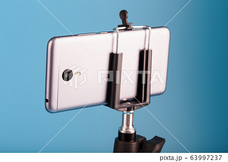 Smartphone on a tripod as a photo-video camera on 63997237