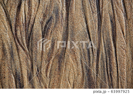 Wet sea sandstone with traces of groundwater Wet sea sandstone with traces of groundwater 63997925