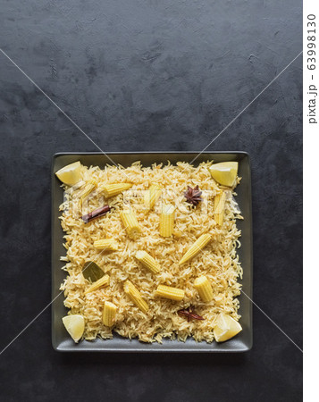Baby corn pulao. Vegetarian biryani, Indian food Baby corn pulao. Vegetarian biryani, Indian food 63998130