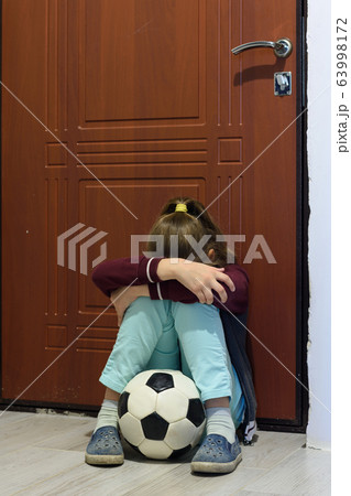 Upset girl is not allowed to walk with the ball on Upset girl is not allowed to walk with the ball on 63998172