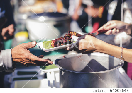 Helping the poor with free food to alleviate Helping the poor with free food to alleviate 64005648
