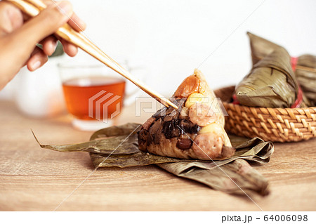 Close up Zongzi or rice dumpling on the wooden 64006098
