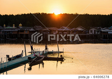Fisherman village and musque at sunset, Phang Nga 64006278