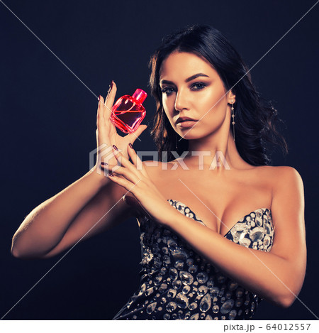 sensual young woman in a beautiful dress with 64012557