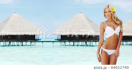 woman on tropical beach 64012740