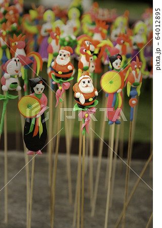 To he (toy figurine) is a traditional toy for children in Vietnam 64012895