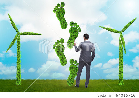 Carbon footprint concept with businessman Carbon footprint concept with businessman 64015716
