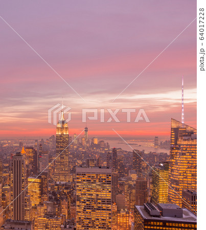 Night view of New York Manhattan during sunset Night view of New York Manhattan during sunset 64017228