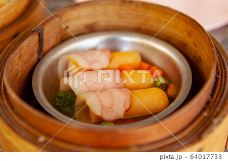.Bacon wrapped sausage .Bacon wrapped sausage 64017733