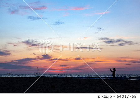 Asian woman selfie with smartphone 64017768