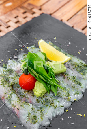 Sea bass sashimi 64018736