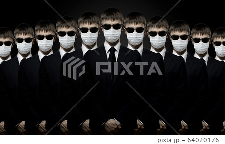 man in black costume in medical mask man in black costume in medical mask 64020176