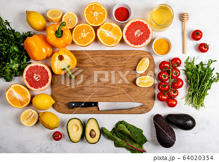 Board with healthy products for Immunity boosting or diet food top view. Vegetables and fruits to boost immune system. Copy space for text. Top view. 64020354