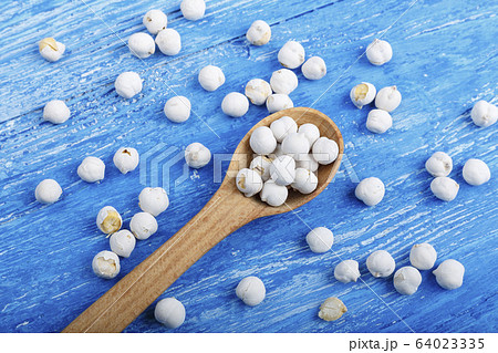 dry chickpeas scattered on the table dry chickpeas scattered on the table 64023335