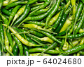 Close up top view of unripe green chilli Close up top view of unripe green chilli 64024680