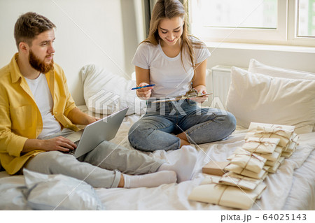 married couple sort out letters invitations for housewarming married couple sort out letters invitations for housewarming 64025143