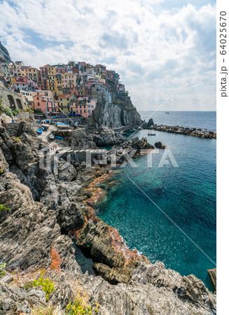 Italian coastline and colorful Manarola village in Cinque Terre, Italy 64025670