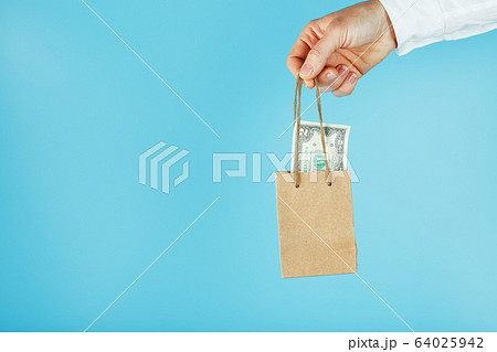 A small paper bag for financial aid and support A small paper bag for financial aid and support 64025942