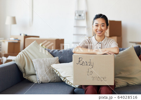 Young Asian Woman Ready to Move Young Asian Woman Ready to Move 64028516