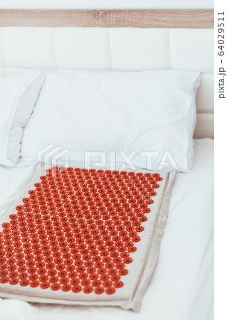 Acupuncture mat in the bed Acupuncture mat in the bed 64029511