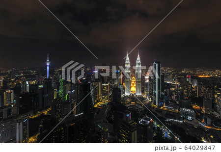 Aerial view of Kuala Lumpur city center skyline at night Aerial view of Kuala Lumpur city center skyline at night 64029847