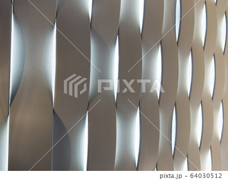 View on abstract wall with backlights in urban cafe interior View on abstract wall with backlights in urban cafe interior 64030512
