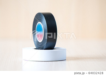 Black and white insulating tapes to insulate twisted of electrical wires. 64032428