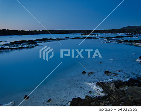 A lake with milky thermal water in Grindavik 64032565