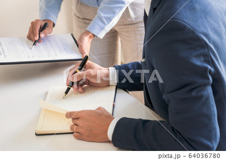 Male lawyer or judge consult with client check 64036780