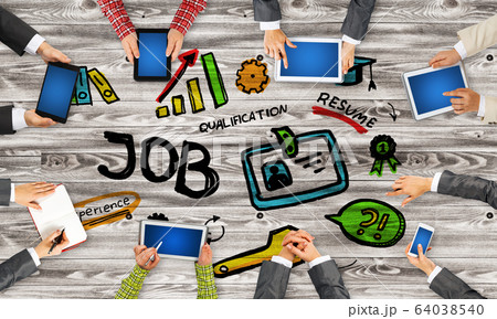 Top view of businesspeople sitting at table and using gadgets 64038540