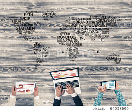 Top view of businesspeople sitting at table and using gadgets Top view of businesspeople sitting at table and using gadgets 64038690
