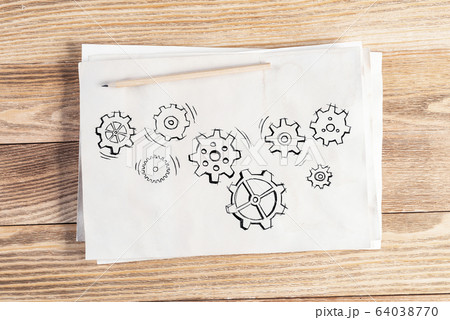 Group of rotating gears pencil hand drawn Group of rotating gears pencil hand drawn 64038770