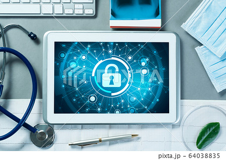 Web security and technology concept with tablet pc on table Web security and technology concept with tablet pc on table 64038835