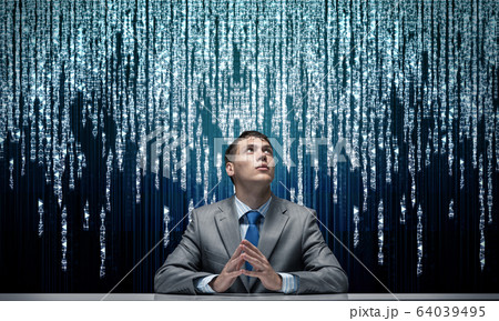 Handsome man folded hands and having serious face 64039495