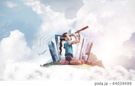 Concept of careless happy childhood with girl looking in future Concept of careless happy childhood with girl looking in future 64039499